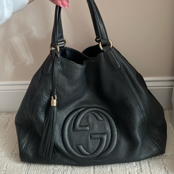 Gucci Handbags - Oversized Gucci Leather Purse. GENTLY used looks BRAND NEW beautiful & soft